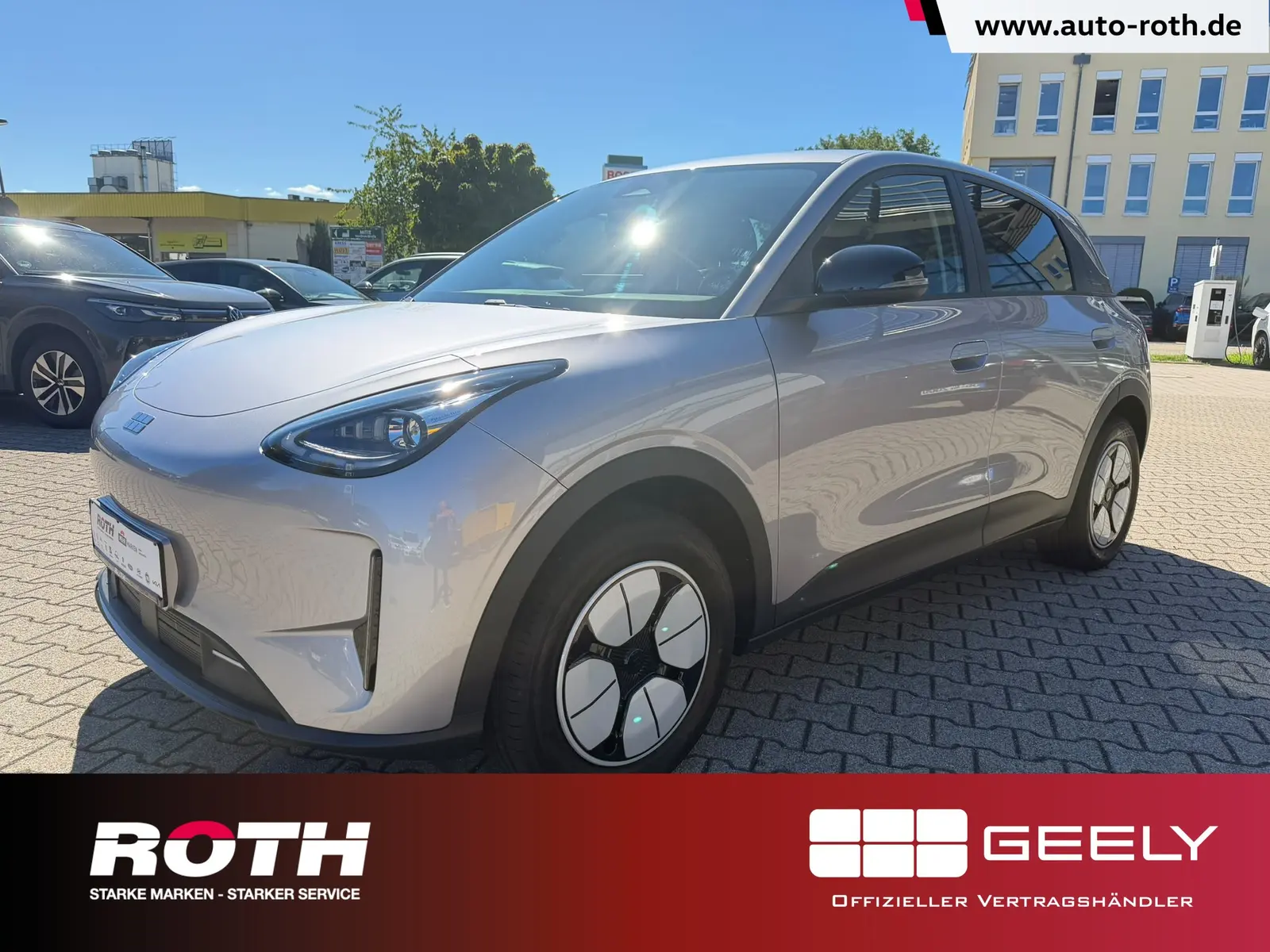 Geely E2 60 kW 35 kwh automat, strieborná, 99 km, Nemecko — foto 1